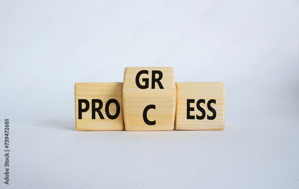 Process and Progress symbol. Wooden cubes with words Process and Progress. Beautiful white background. Business and Process and Progress concept. Copy space Process and Progress symbol. Wooden cubes with words Process and Progress. Beautiful white background. Business and Process and Progress concept. Copy space