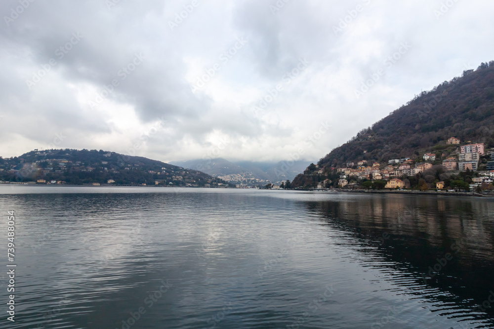 Panoramic view of the Como Lake in a cloudy day