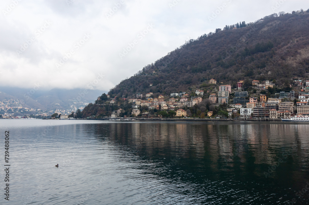 Panoramic view of the Como Lake in a cloudy day