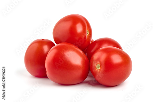 Ripe fresh tomatoes, close-up, isolated on white background.
