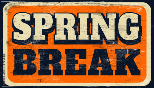 Old and worn retro spring break sign on wood