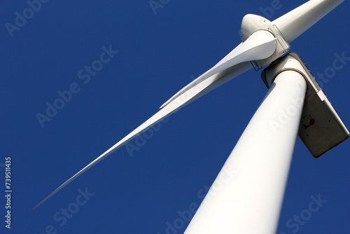 A windturbine and a blue sky photo