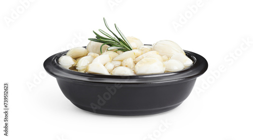 Peeled garlic cloves with honey and rosemary in bowl isolated on white