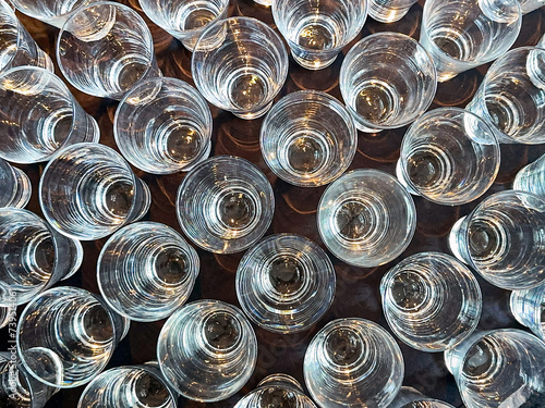 Pattern formed by th tops of drinking glasses on the table of a restaurant