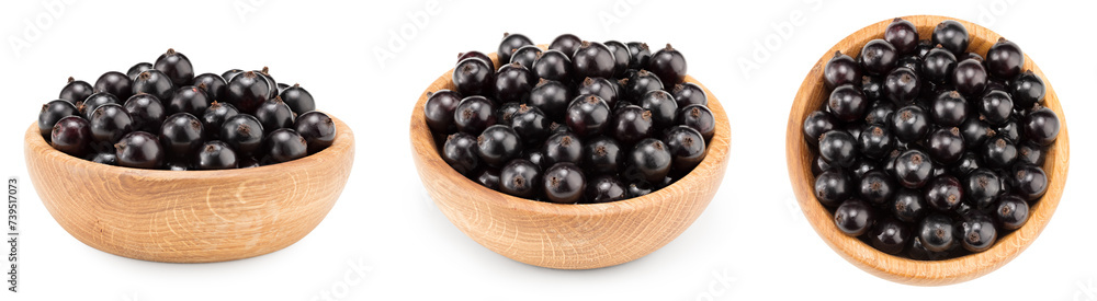 black currant in wooden bowl isolated on white background. macro. clipping path black currant in wooden bowl isolated on white background. macro. clipping path