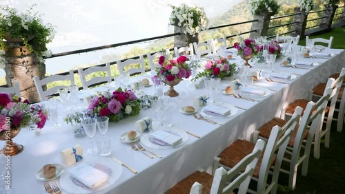 Indulge in the romantic ambiance of an Italian villa adorned with exquisite wedding decor. This stock footage captures the charm and elegance of a dreamy celebration amidst the scenic beauty of Italy.