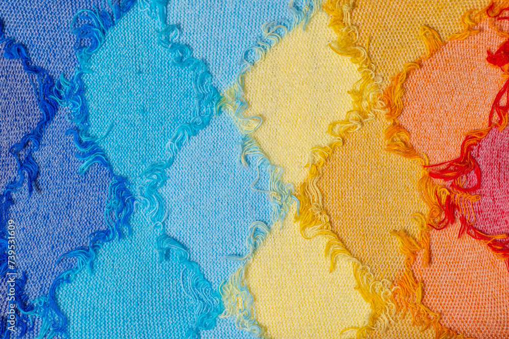 Colorful threads. Argyle pattern. Cold colors vs warm colors background