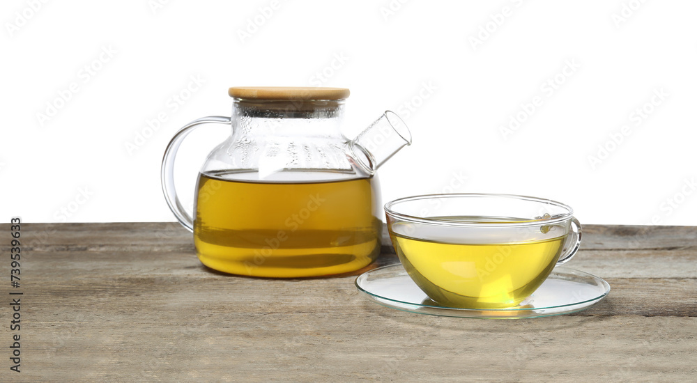 Refreshing green tea in cup and teapot on wooden table against white background Refreshing green tea in cup and teapot on wooden table against white background