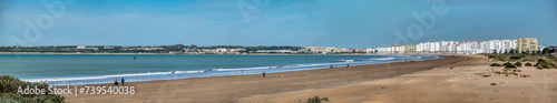 Large panoramic view of the stunning Valdelagrana beach, located in the touristy Andalusian town of El Puerto de Santa Maria, Spain photo