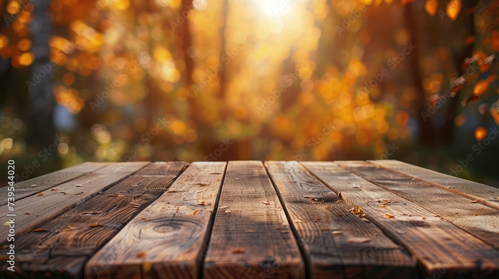 The empty wooden table top with blur background of autumn. Exuberant image. The empty wooden table top with blur background of autumn. Exuberant image.
