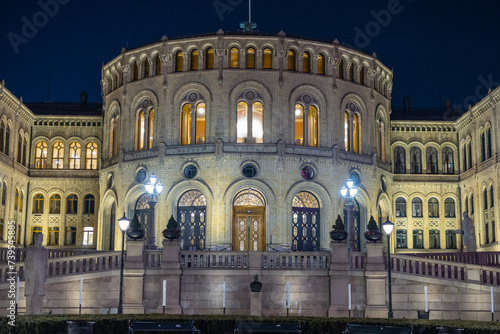 Parliament building in Oslo, Norway, on a cold winter night. Nightscape photo in oslo, ice and snow on the ground in front of Parliament.