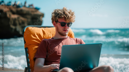 A man works on a laptop while seated on an orange chair by the ocean, symbolizing a remote freelance lifestyle. Ai generative