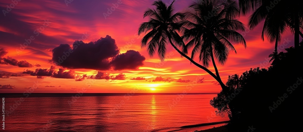 Tropical paradise at sunset with palm trees, boat, and stunning water reflections