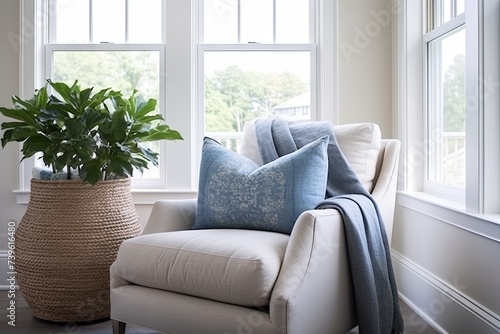 Coastal Bliss: Fabric Lounge Chair Decor with Serene Bedding and Blue Accents