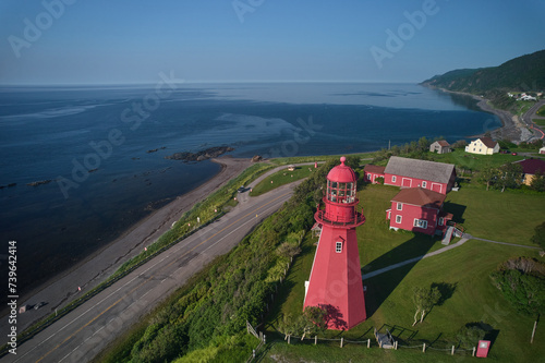 aerial drone image of The Mercury Bath Fresnel lens of the La Martre Lighthouse on the Gaspe Peninsual in Quebec Canada photo