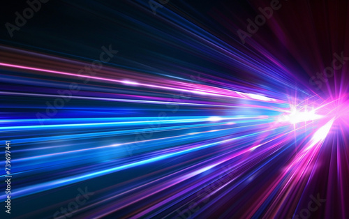 Blue and violet beams of bright laser light shining on black background