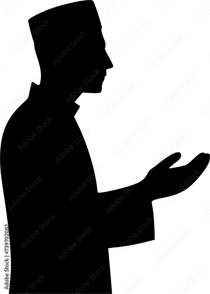 Silhouette of a Moslem person praying