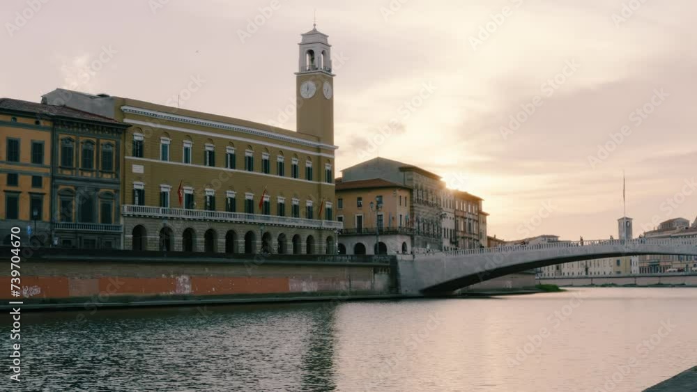 Arno River and Ponte di Mezzo, Lungarno Boulevard at sunset in Pisa, Tuscany, Italy Arno River and Ponte di Mezzo, Lungarno Boulevard at sunset in Pisa, Tuscany, Italy