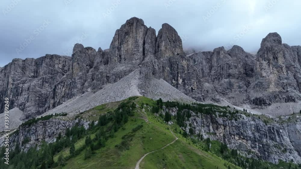 Rocky Dolomite mountains in Italy, aerial drone view Rocky Dolomite mountains in Italy, aerial drone view