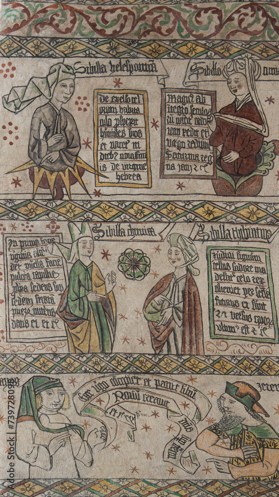 medieval story telling painted on a white wall in Arhus cathedral