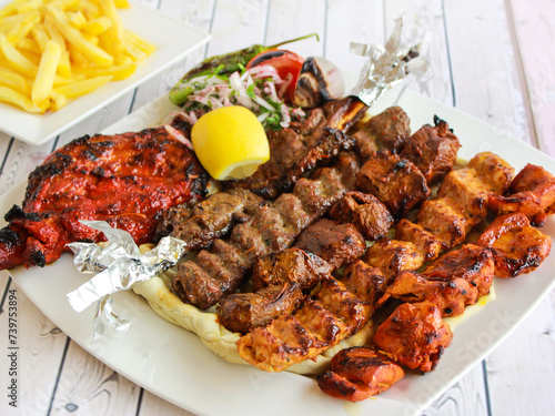 Foto Mix Grill Platter with chicken tikka, beef kabab, mutton kebab, seekh kabab and