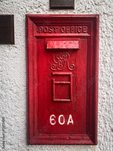 Vintage Red Post Office Box Mounted on Wall, Hong Kong photo