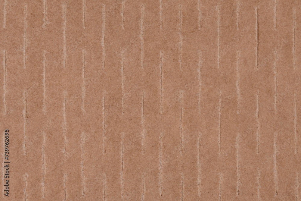 Fototapeta premium Efekt naciętej tektury, papier pakowy brązowy z bliska