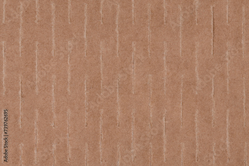 Efekt naciętej tektury, papier pakowy brązowy z bliska
