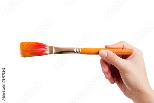 A person firmly holds a brush in their hand, ready for artistic creation. on a White or Clear Surface PNG Transparent Background.