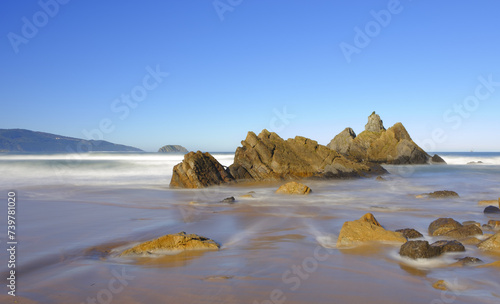 Laga beach. Rocks on Laga beach, located between the Urdaibai Biosphere Reserve and Cape Ogoño, Basque Country. photo