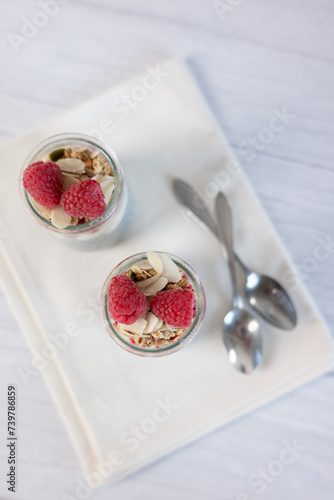 Home made chia pudding with granola and berries. Selective focus.