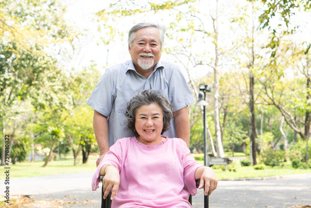 Asian healthy senior couple relaxing in the park together. Asian healthy senior couple relaxing in the park together.