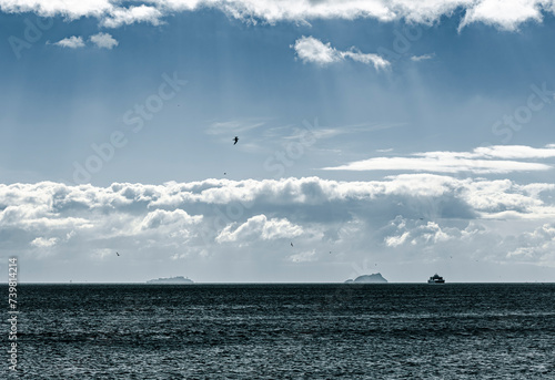 A cloudy weather at the horizon and a ship © cemkurtulus