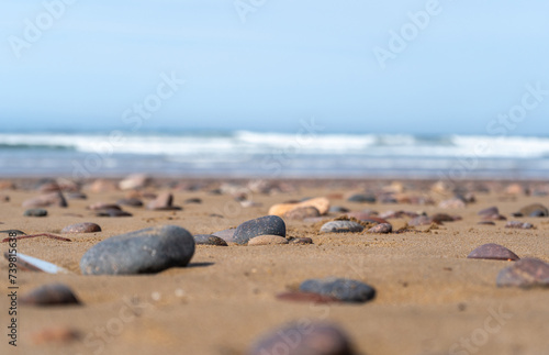 Colored Pebble Beach Texture Background, Sand and Rocky Shore Pattern, Red Morocco Beach, Africa