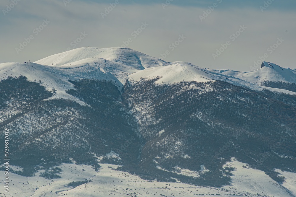 winter mountain landscape and dark sky
