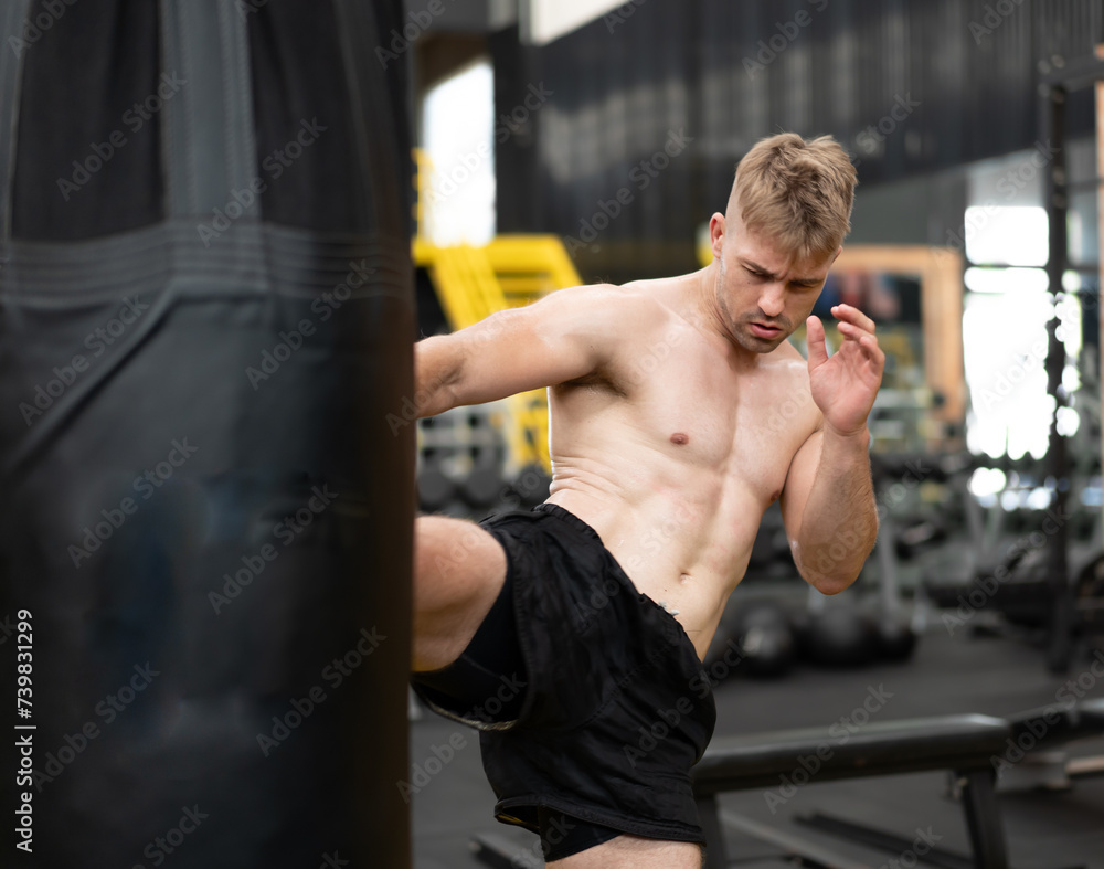 Male athlete boxing competition in ring. Caucasian ethnic man punch fighting in kickboxing exercise in fitness gym. Boxing is fighter sport training need body strength and power fist to knockout.