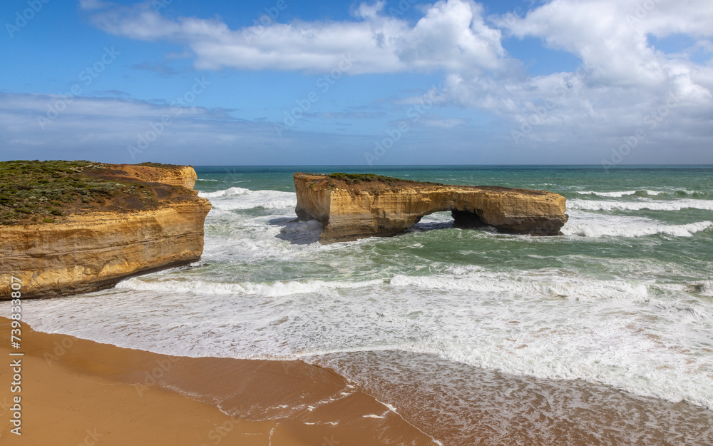 The London Bridge rock formation on the Great Ocean Road, Port Campbell National Park, Australia. The stone stacks were connected until 1990, forming a double arch bridge.