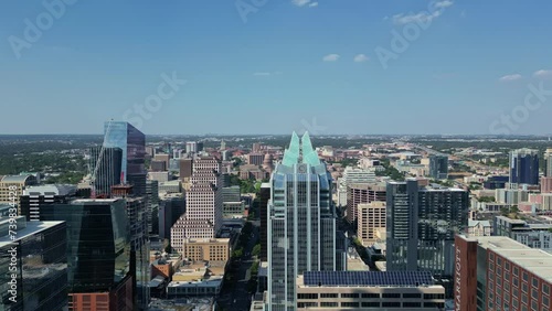 Aerial Reverse reveal from Frost Bank Tower towards the river in  Austin Texas photo