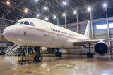 Large White Jet in a Hangar An Image of Modern Transportation