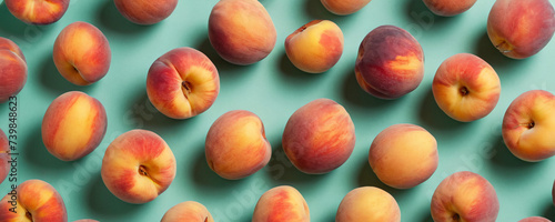 A collection of ripe  juicy peaches basking in their sun-kissed glory  set against a soothing mint background. The image captures the essence of summer  with the vibrant colors.