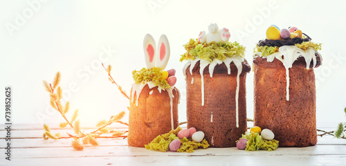 Paska - Easter Eve sweet bread with icing decorated with eatable "moss" still life with willow. Popular dessert during Eastern Orthodox Easter. Old cultures traditions and healthy eating concept image