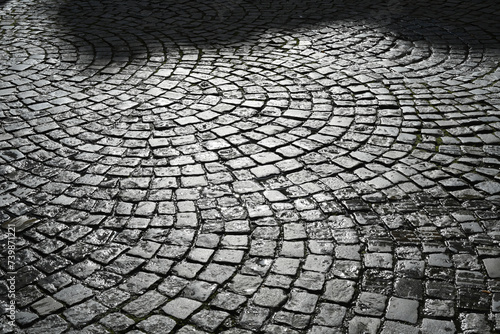 cobblestones in a street against the light