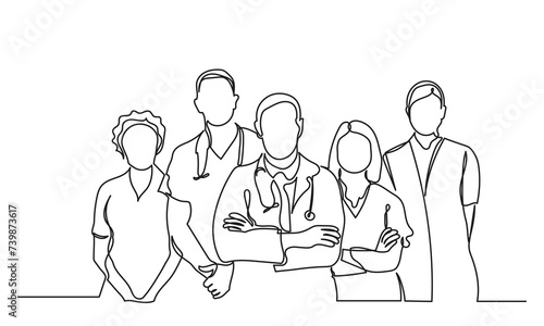 single continuous line drawing doctors team. a group of young male and female doctors pose standing together.Medical healthcare service concept.