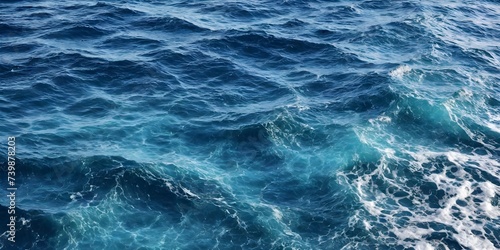 Blue sea water texture. Water splashing in the deep sea. © 360VP