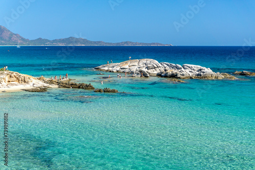 Scoglio di Peppino beach, Costa Rei, Muravera, Castiadas. Sardinia. Beach with white sand and crystal clear waters and the famous rock photo