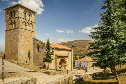 Photos View of the Collegiate Church of San Pedro de Cervatos amidst nature