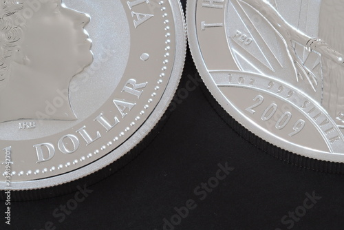 An Australian One Ounce Silver Dollar 2009 Kookaburra. Collectable Bullion precious metal is shown by a close-up macro photo.