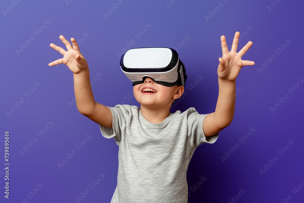 A child plays in a VR helmet. Virtual reality. A child plays in a VR helmet. Virtual reality.