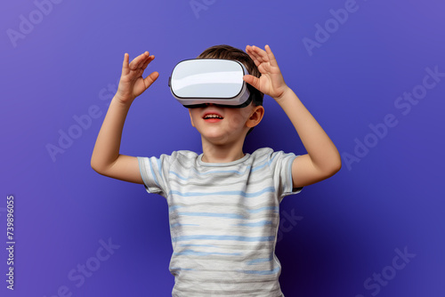 A child plays in a VR helmet. Virtual reality.