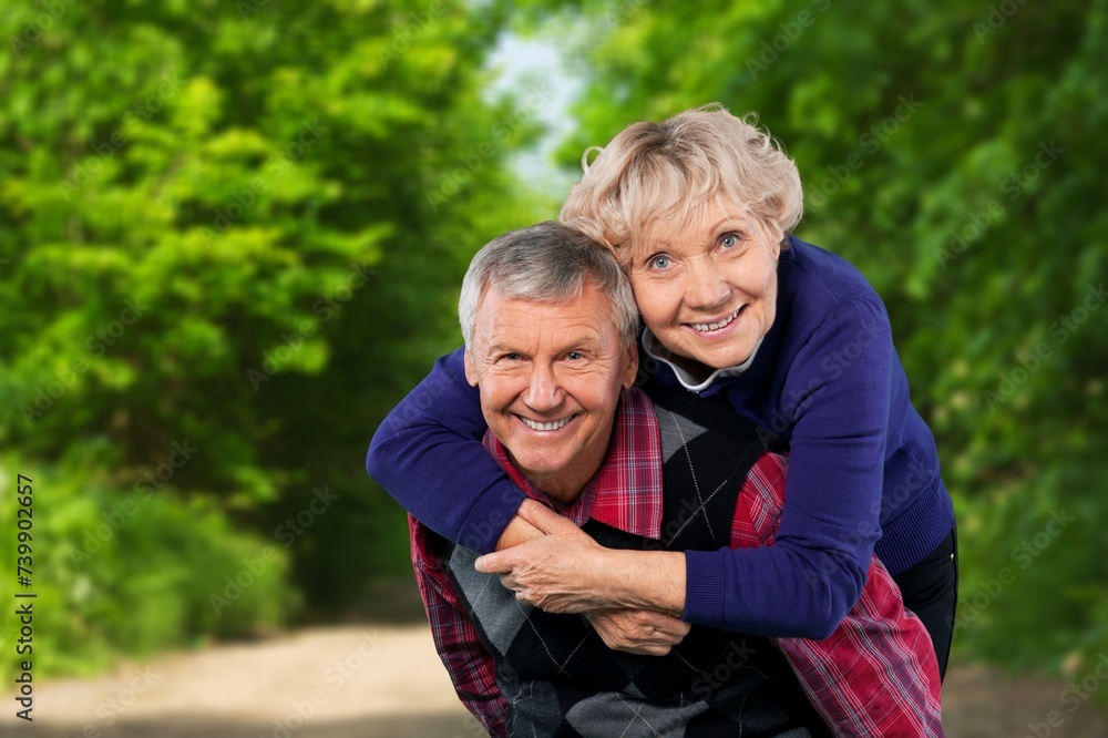 Romantic Senior old Couple Walking together Outdoors